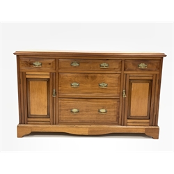 Edwardian walnut sideboard, fitted with five drawers and two cupboards