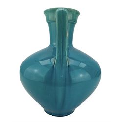 Burmantofts Faience turquoise-glaze twin-handled vase of amphora form, with angled handles and moulded rim, impressed factory marks beneath, model no. 1819, H26cm