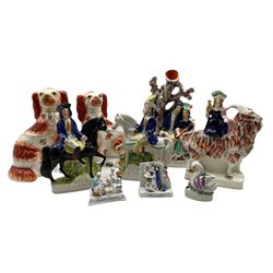 Group of Victorian Staffordshire figures including Tom King and Dick Turpin, 'The Rival' flatback group, pair of Spaniels, Swan pen holder and three Fairings 