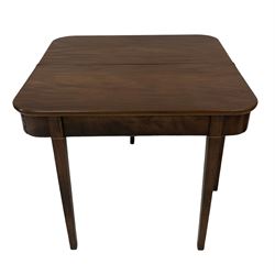 Mahogany fold over table, raised on square tapering supports 