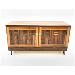 Troeds of Sweden - Mid century rosewood sideboard cupboard, two doors with brass handles enclosing shelf, raised on ebonised tapered and splayed supports 