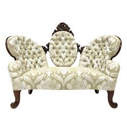 Horrix Brothers of The Hague, Holland - mid to late 19th century mahogany settee, cameo back with c-scroll and foliate carved cresting, upholstered in deeply buttoned champagne Damask type fabric with overall floral design, sprung seat, on cabriole front supports, stamped underneath 'Horrix.te 's-Gravenhage'