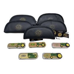 Five John Deere folding collectors knives by Franklin Mint, each housed in a faux leather pouch (5)