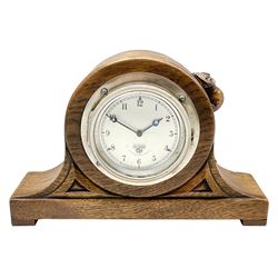 'Mouseman' 1930s oak mantel clock, dome top carved with mouse signature, the front with triangular carvings, fitted with 'Smiths MA' car clock, serial number. P 229.437, by Robert Thompson of Kilburn