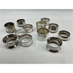 Collection of twelve silver napkin rings, various dates and makers including a pair by Sharman D Neill, Dublin 1911, approx 6.4oz