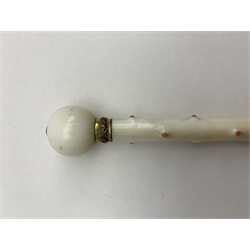 19th century carved ivory parasol handle in the form of a walking stick, twig-like finish with inset coral nodules, ball finial and gilt metal collar, L15cm