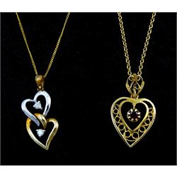 White and yellow gold two stone diamond interlocked heart pendant necklace and a gold garnet openwork heart pendant necklace, both hallmarked 9ct 