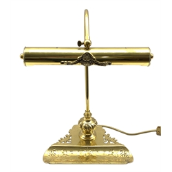 Edwardian style brass desk lamp with adjustable cylindrical shade on pierced base with pen tray aperture, H41cm 