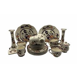 Mason's Mandalay pattern tea and table ware to include eight breakfast cups and saucers, six side plates, preserve jar and cover, sugar bowl, two ashtrays, pair of candlesticks, together with a pair of Mason's Mandarin dinner plates 