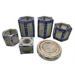 Pair of Chinese blue and white reticulated candle lanterns or vases of hexagonal form, two smaller examples and an ink pot stand, together with a Chinese Provincial inkstone with six character mark beneath D13cm 