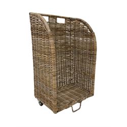 Cane basket log carrier, on castors