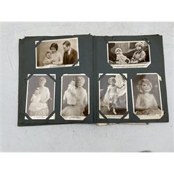 Edwardian postcard album containing approx 100 cards of English and European royalty from Edward VII and a few topographical cards  