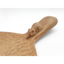 Thompson of Kilburn Mouseman oak cheese board of oval design, the raised handle with carved mouse signature L37cm
