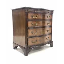 Georgian design mahogany serpentine front chest, cross banded moulded top over brushing slide and four graduated drawers, canted fluted corners, raised on shaped bracket supports 