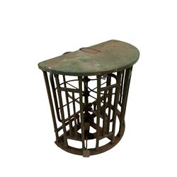  A cast iron turnstile from York City football ground by Ellison & Co., Manchester, painted green with crowed counter with brass plate H104cm, W110cm, D104cm 