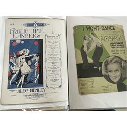 Two albums of Victorian and later sheet music covers, one album related to Dancing which includes The County Barn Dance, The O.K. Fox Trot, Oo-La-La! Lancers, Radio Waltz Medley, the other album mainly 40's and 50's sheet music and many others (approx 110) Provenance: From the Estate of a Local private collector