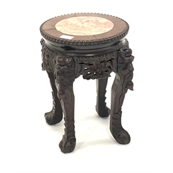 Late 19th Early 20th century Chinese hardwood jardinière stand, rouge marble inset top enclosed by beaded moulding, raised on four floral carved supports 