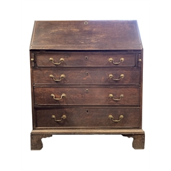 Early 19th century oak bureau, fall front revealing fitted interior over four long graduated drawers, raised on bracket supports 
