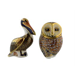 Royal Crown Derby paperweight 'Brown Pelican' with gold stopper and another 'Barn Owl' with silver stopper (2)