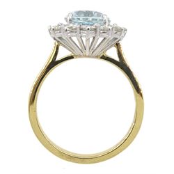 18ct gold oval aquamarine and round brilliant cut diamond cluster ring, hallmarked, aquamarine approx 2.35 carat, total diamond weight approx 0.75 carat