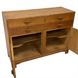 Heals of London - circa. 1930s oak sideboard, fitted with three drawers over two cupboards with applied rectangular panels, on bracket feet, the top right drawer with circular plaque 