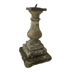 Composite stone sun dial, the dial on one column raised on a stepped base H96cm 