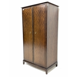 Stag Minstrel mahogany wardrobe, two doors enclosing four shelves, two slides and hanging rail 