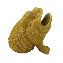 Burmantofts Faience ochre-glaze spoon warmer modelled as a grotesque seated toad, impressed factory marks beneath, model no. 451, H14.5cm. Provenance: From the Estate of the late Dowager Lady St Oswald