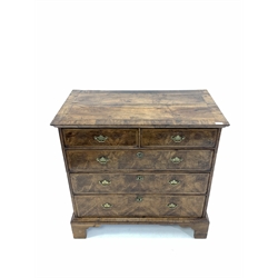 18th century walnut chest, cross banded top over two short and three long graduated drawers with herringbone inlay, raised on bracket supports 