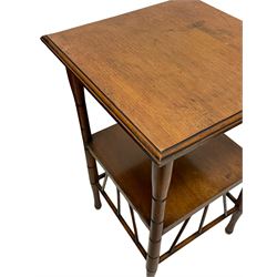 After E. W. Godwin - circa. 1890s Aesthetic Movement walnut side or occasional table, the moulded top on ring turned supports, with undertier supported by lower spindle rails