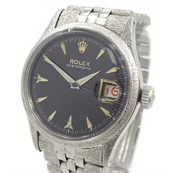 Rolex Oyster Perpetual Date gentleman's stainless steel automatic wristwatch, circa 1954,  21 jewels, Ref. 6518, Cal. 1000, Serial No. 33738, black dial with applied sharks tooth markers with luminous dots and hands, the movement numbered 475052, bark effect bezel and lugs, on original Jubilee polished and bark effect bracelet, with fold-over clasp engraved U.S.A