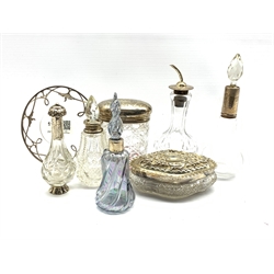 Glass and silver atomiser, four silver and glass scent flasks, two glass dressing table jars with silver covers and a Continental silver overlaid glass saucer dish