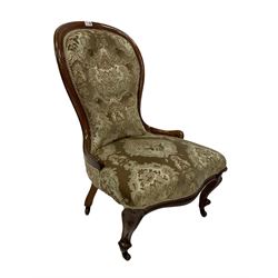 Victorian nursing chair, the mahogany show frame with floral upholstery, raised on ceramic castors  