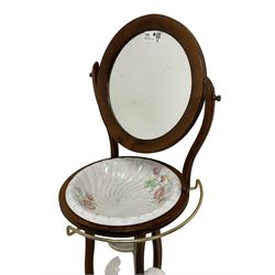 Georgian design shaving washstand, circular swing mirror over bowl rests with brass towel rail, waived supports united by undertier, with ceramic bowls and jug