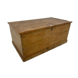 Late 19th century pine blanket chest, hinged top with iron fittings, raised on plinth base