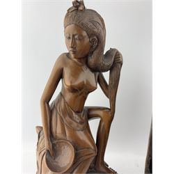 19th century African wooden spice mortar, with carved geometric pattern and brass stud work H22cm, pair of Chinese bronze stands on three splayed supports, Balinese hardwood carved figure of a semi nude woman etc