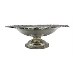 Silver cake dish with pierced moulded border, engraved with initials and dated and on a pedestal foot D21cm Birmingham 1912 Maker Elkington & Co 9.5oz