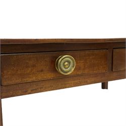 Early 19th century mahogany side table, rectangular top over two scratch moulded drawers, fitted with pressed brass handles, on square tapering supports