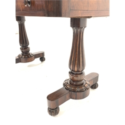 William IV rosewood library table, the well figured rectangular top over two drawers, raised on two baluster turned and lobe carved end supports each leading to platform base, bun feet and recessed castors, 122cm x 61cm, H75cm