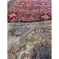 Large washed red ground Persian Hamadan village runner, all over design 330cm x 115