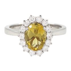 18ct white gold oval cut citrine and round brilliant cut diamond cluster ring, hallmarked