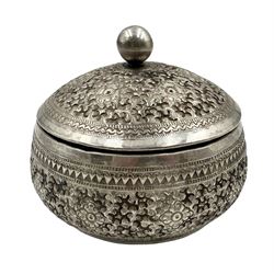 Indian white metal box and cover chased with flower heads and leaves D9cm, tests as approx  75% silver 