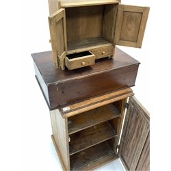 Late 19th century pine bedside cupboard with panelled door enclosing two shelves, (W52cm, H81cm, D50cm) together with an early 20th century oak table top cupboard, with two panelled doors over two drawers, (W36cm) and a stained pine box (W61cm)