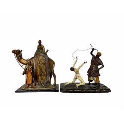 After Bergmann - Spelter table lighter in the form of a carpet seller with camel and rider H19cm and one other Bergmann style figure