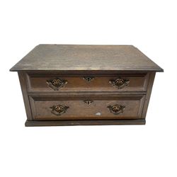 Early 20th century oak table top cabinet with two drawers, L38cm 