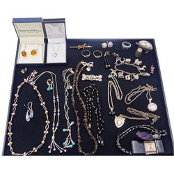 Victorian and later jewellery including 9ct gold tanzanite and diamond ring, pair of 9ct gold black onyx pendant earrings, silver jewellery including charm bracelet, amber acorn pendant earrings, bead jewellery, Yorkshire rose bow brooch, bird design brooch and dachshund brooch, Frey enamel purse watch and a silver hedgehog pin cushion etc