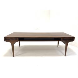 Danish mid-century dark wood coffee table, fitted with two drawers and a magazine shelf, raised on tapered supports, circa 1960 W160cm x 60cm, H51cm