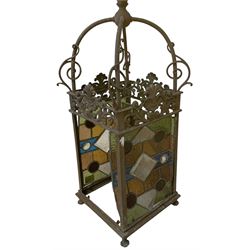 Early 20th century brass square pendant hall lantern with leaded and coloured glass panels H137cm overall and two others of similar design (3)