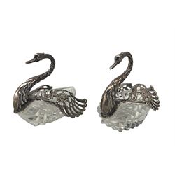 Pair of glass swan salts or sweetmeat dishes with silver necks and hinged wings L10cm