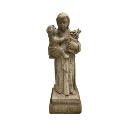 Statue of St Dominic holding Christ Child